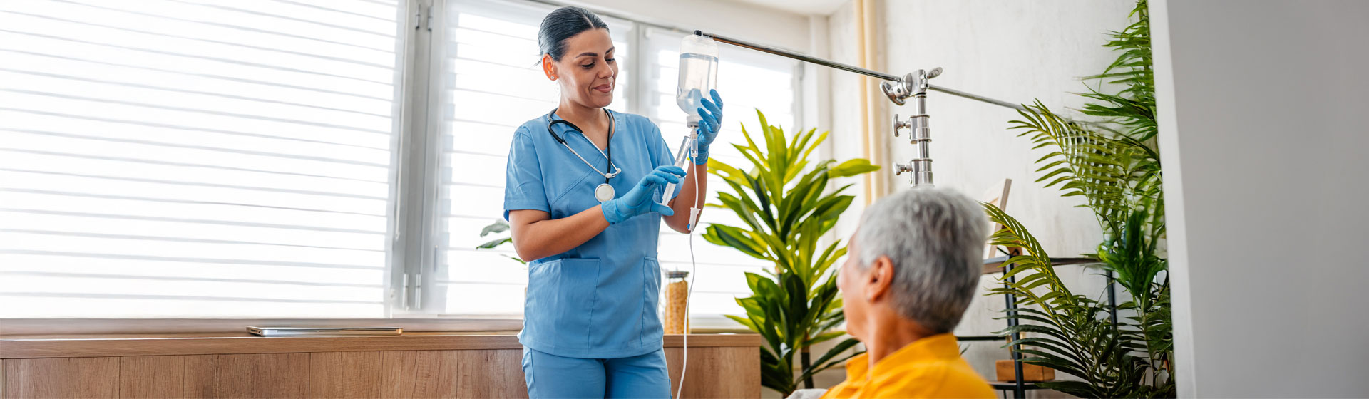 Nursing setting up IV for patient