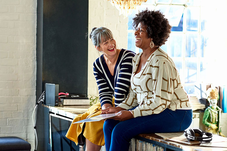 Two Women Chatting - Community Health
