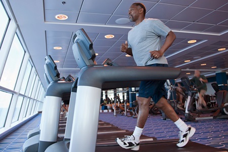 A man runs on a treadmill.