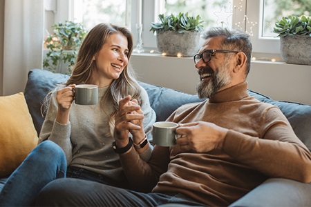 A man and woman have a chat.