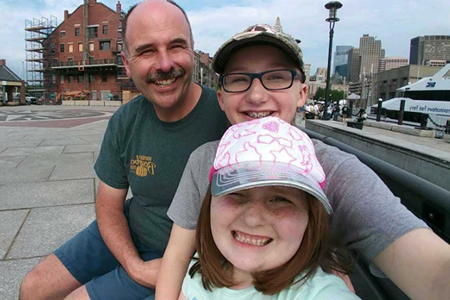 Lahey organ donor Larry Lewis enjoys some time with his family.